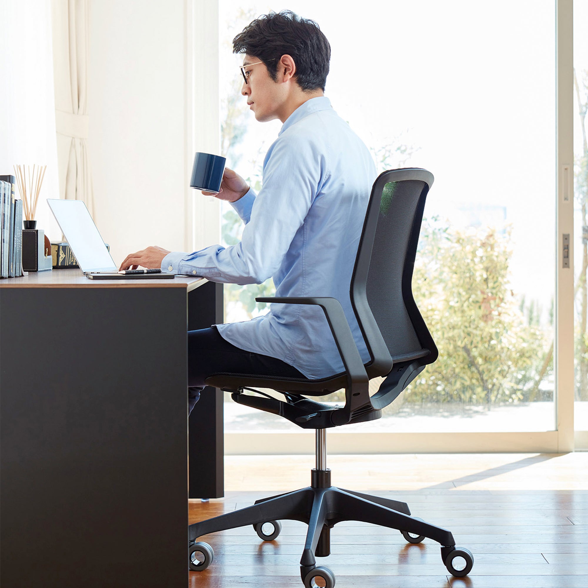 black mesh chair in home office
